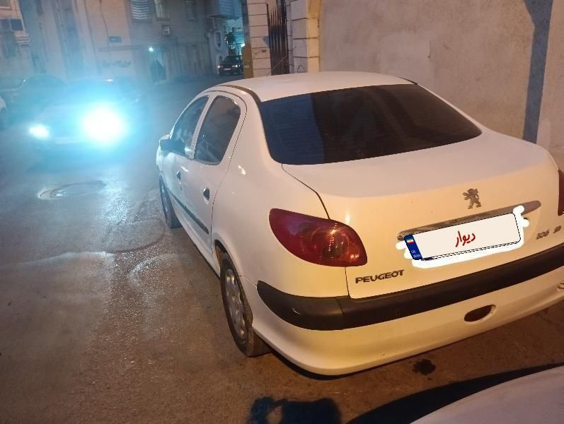 پژو ۲۰۶ صندوق دار v8 - 1394