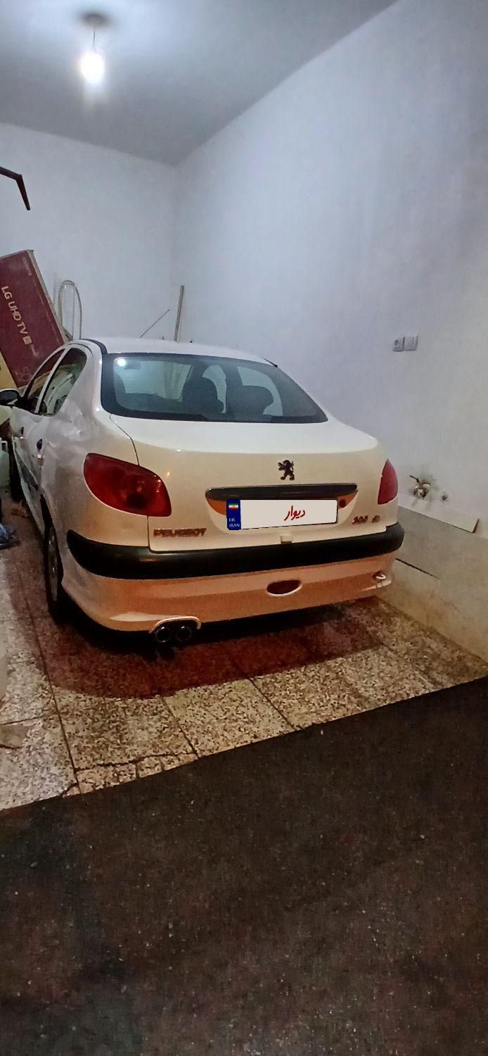 پژو ۲۰۶ صندوق دار v8 - 1391