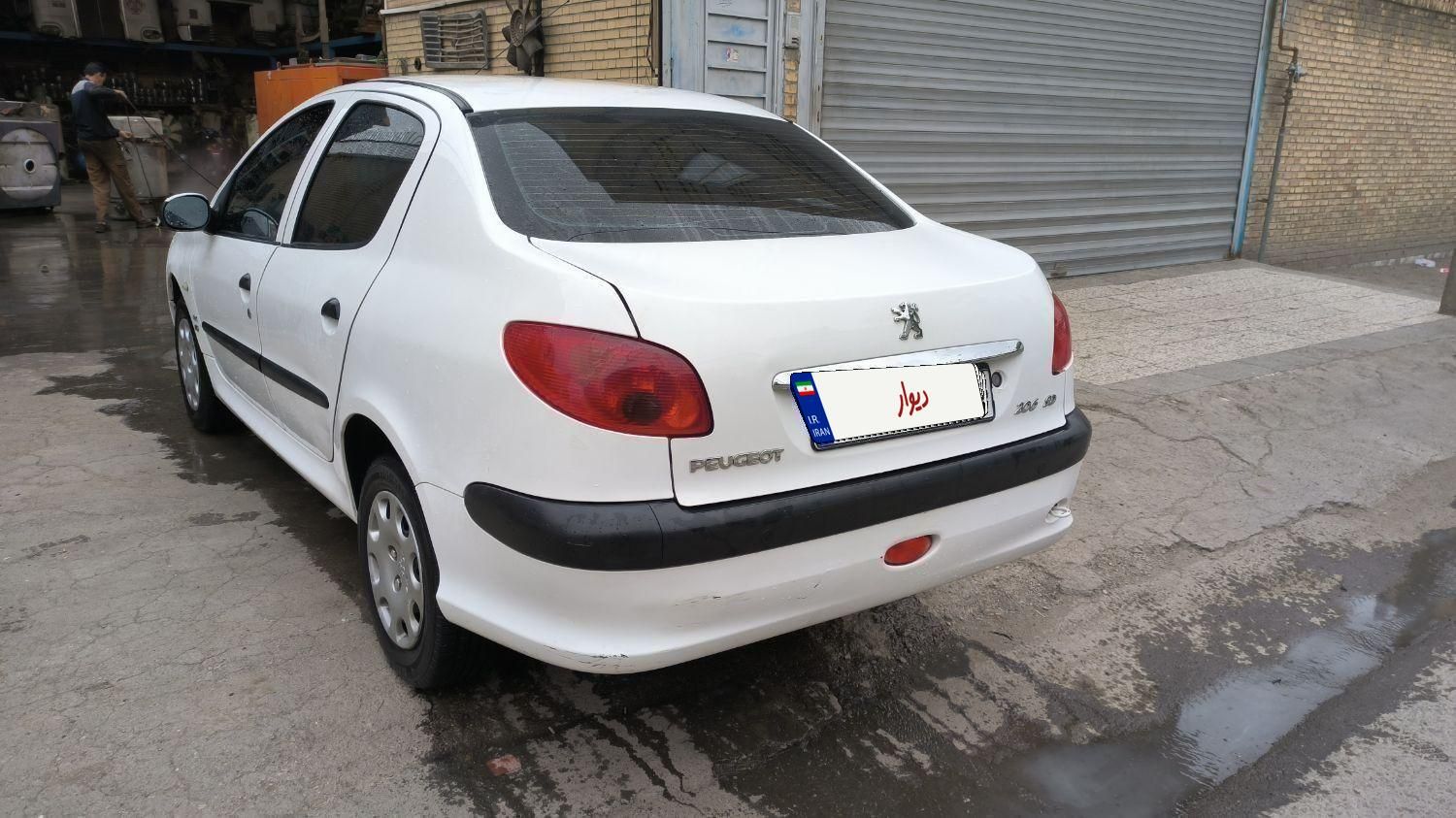 پژو ۲۰۶ صندوق دار v8 - 1396
