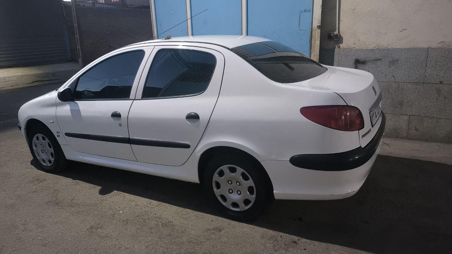 پژو ۲۰۶ صندوق دار v8 - 1396