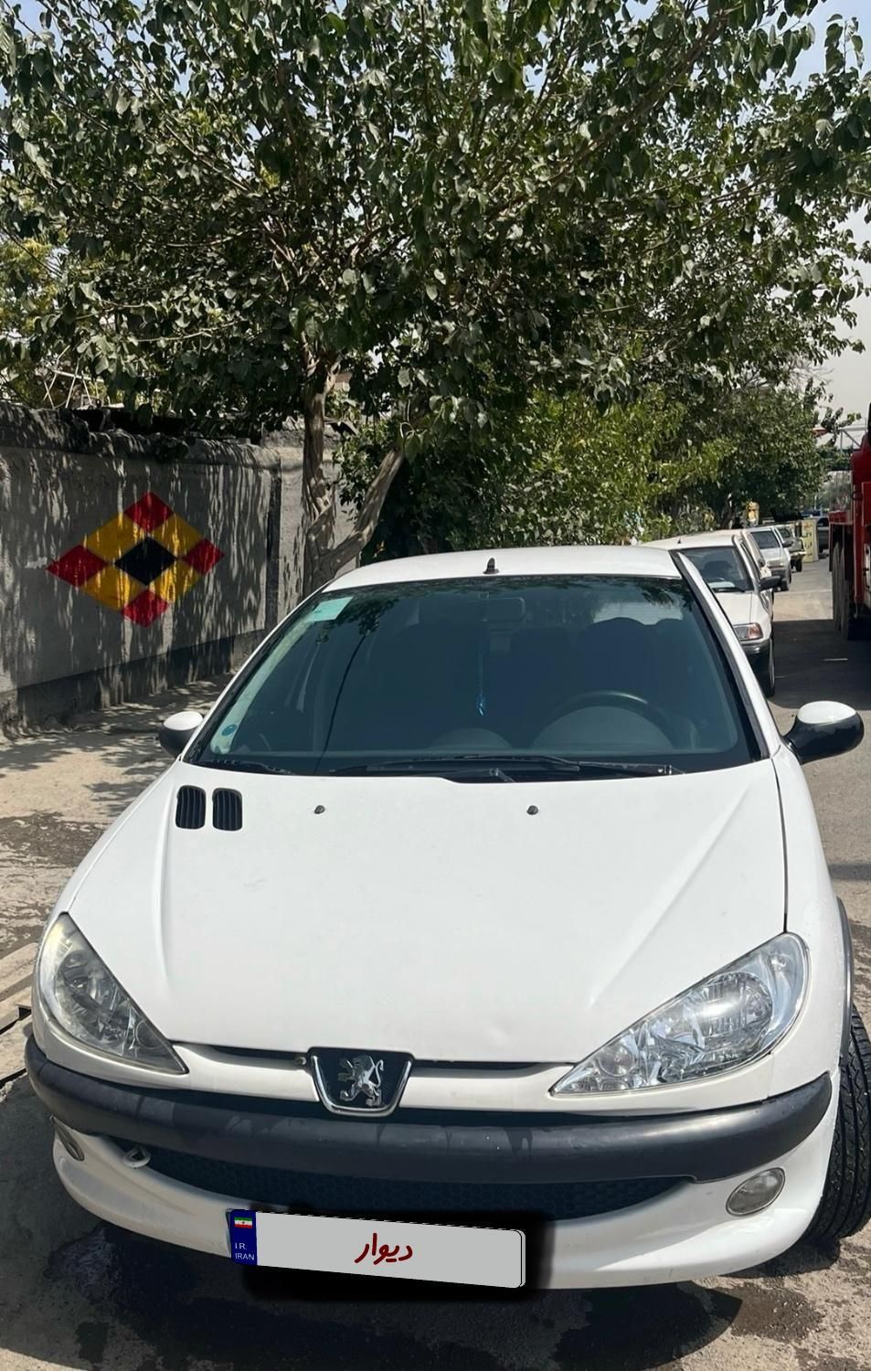 پژو ۲۰۶ صندوق دار v8 - 1396