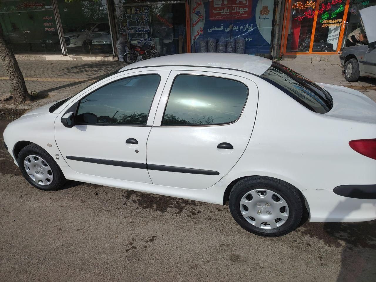 پژو ۲۰۶ صندوق دار v8 - 1396