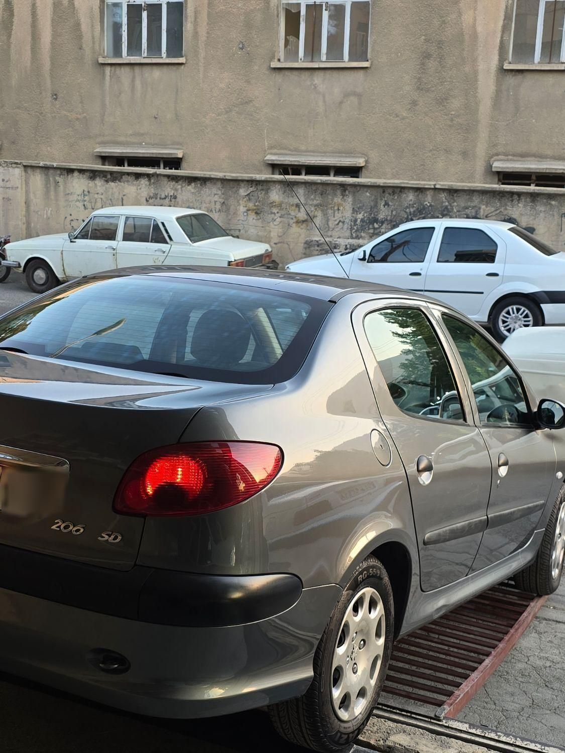 پژو ۲۰۶ صندوق دار v8 - 1397