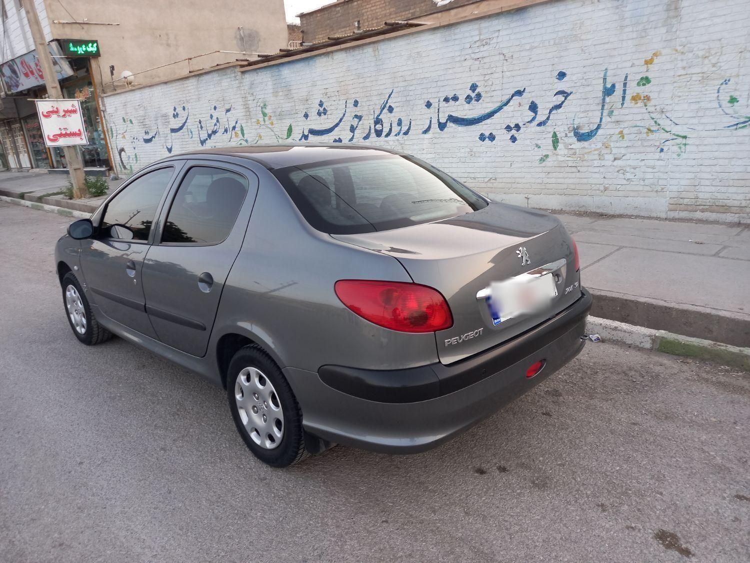 پژو ۲۰۶ صندوق دار v8 - 1396