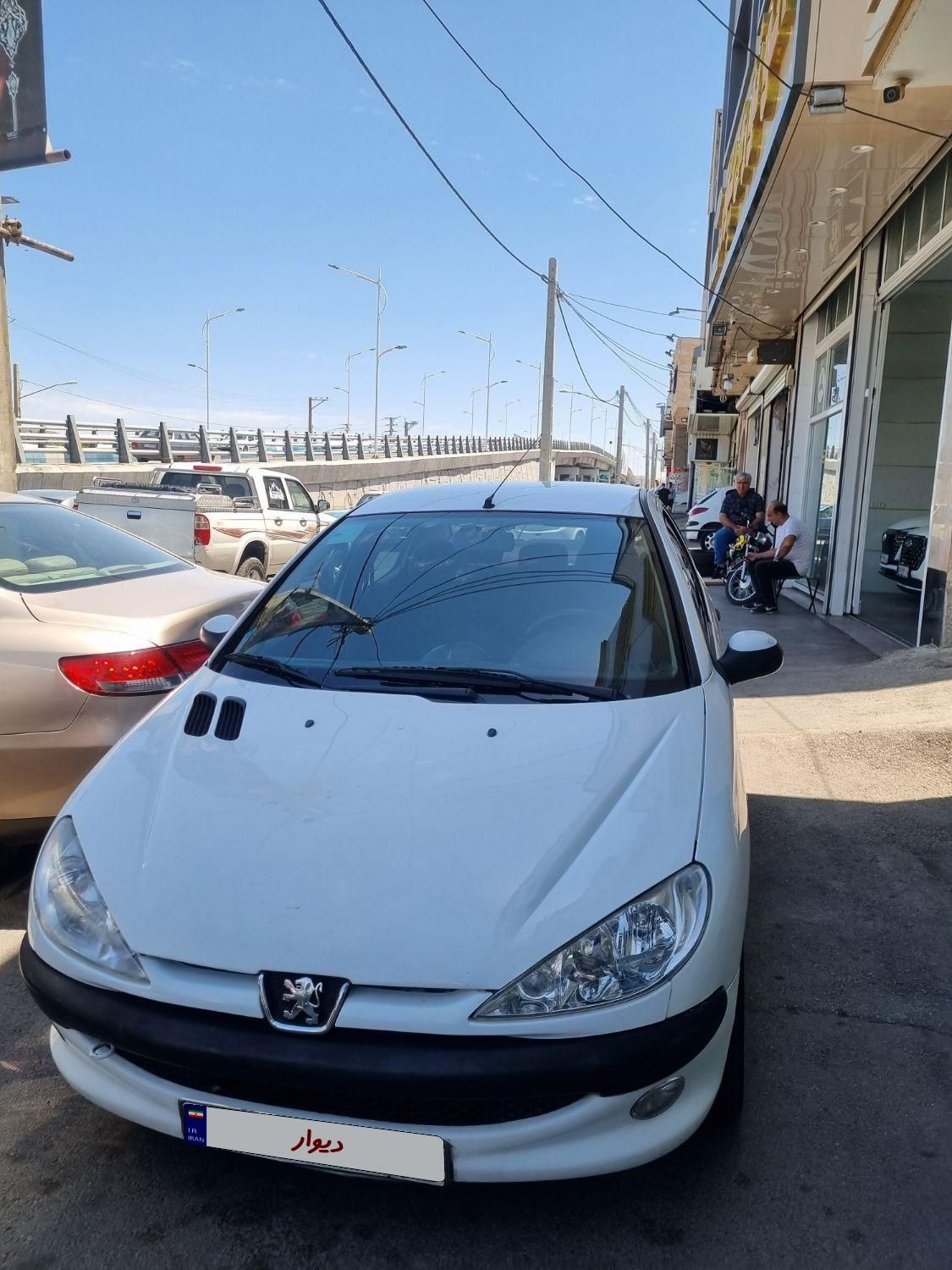 پژو ۲۰۶ صندوق دار v8 - 1396