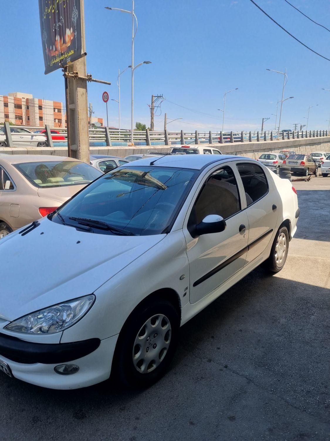 پژو ۲۰۶ صندوق دار v8 - 1396