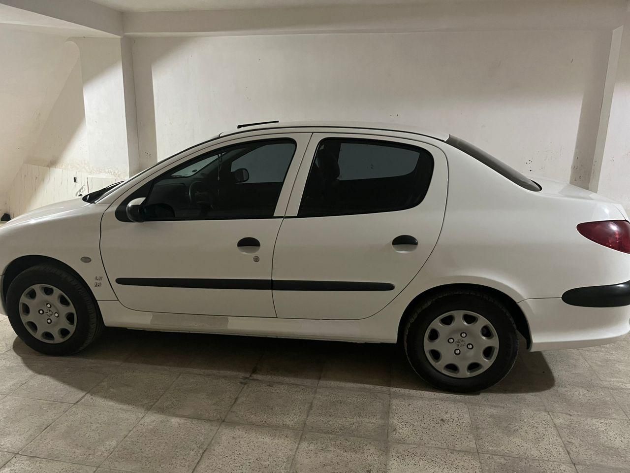 پژو ۲۰۶ صندوق دار v8 - 1399