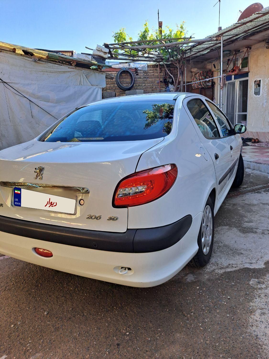 پژو ۲۰۶ صندوق دار v8 - 1396