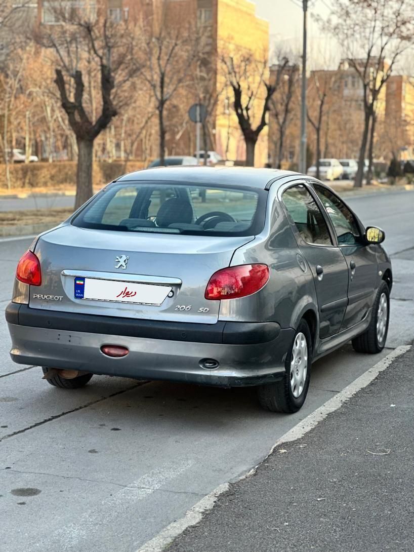 پژو ۲۰۶ صندوق دار v8 - 1393