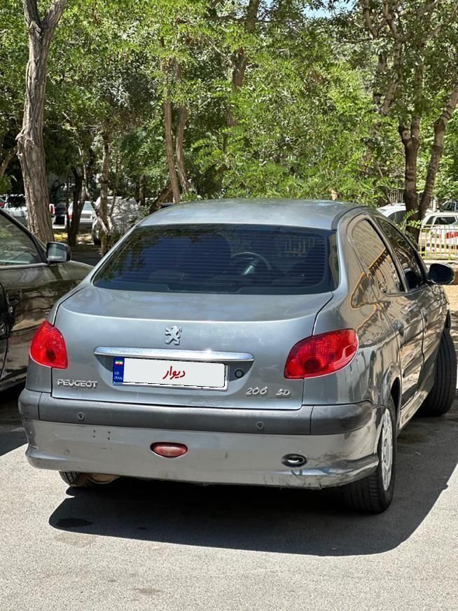 پژو ۲۰۶ صندوق دار v8 - 1393