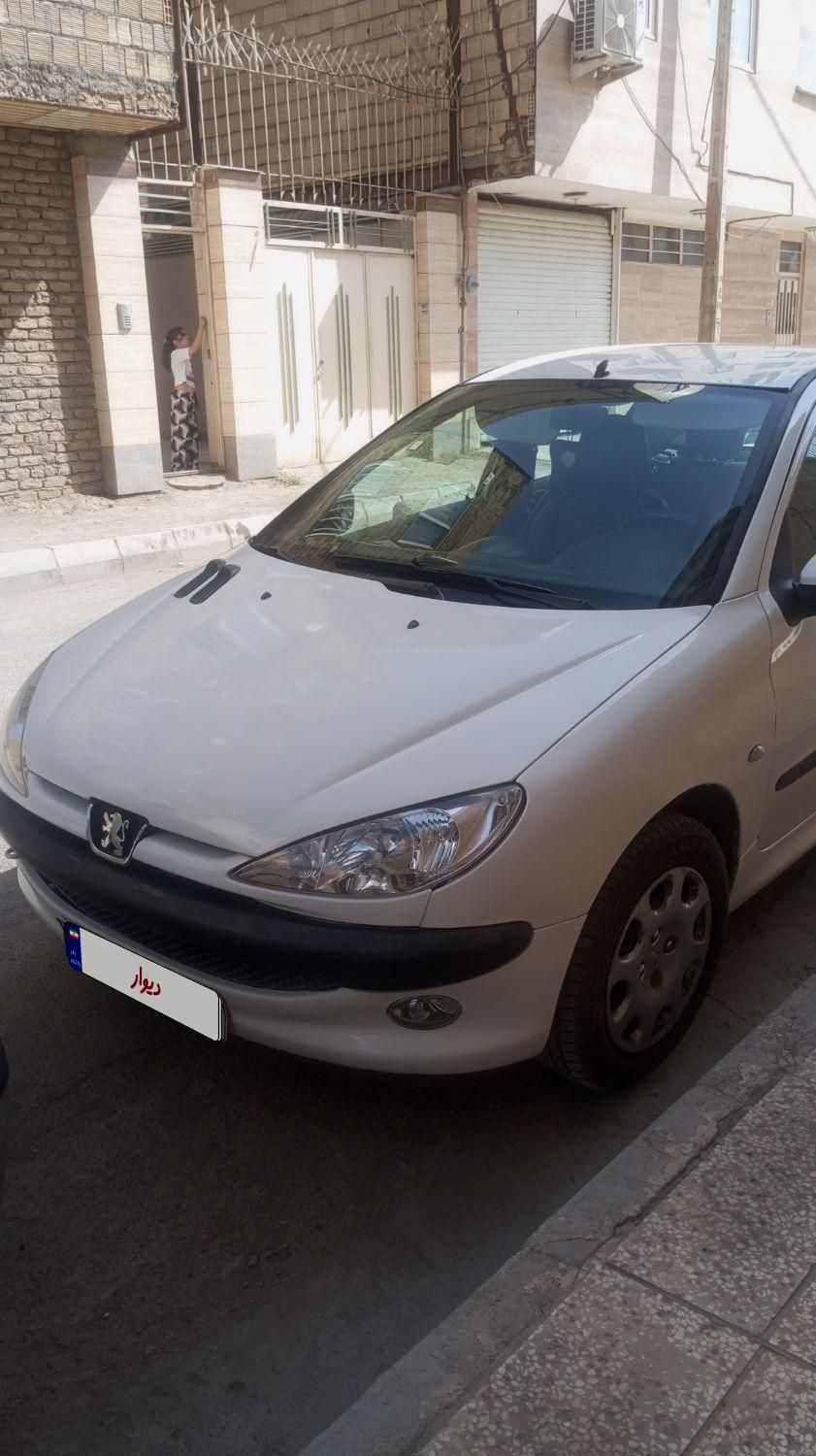 پژو ۲۰۶ صندوق دار v8 - 1396