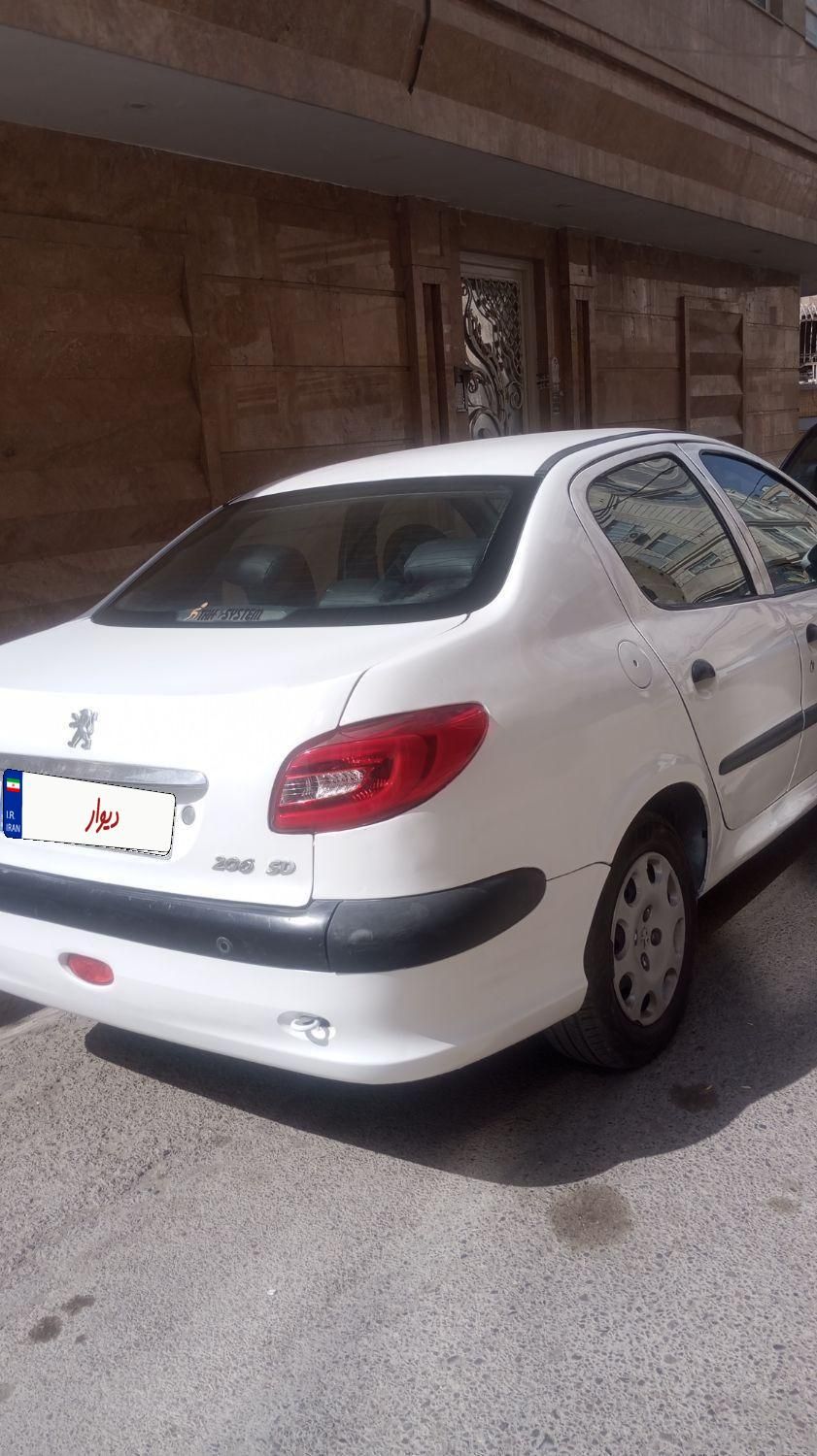 پژو ۲۰۶ صندوق دار v8 - 1396