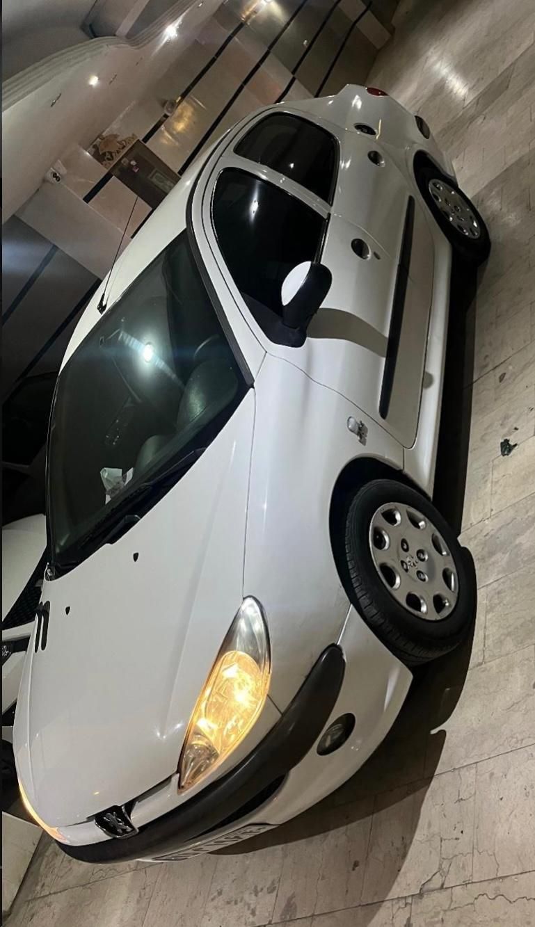 پژو ۲۰۶ صندوق دار v8 - 1390