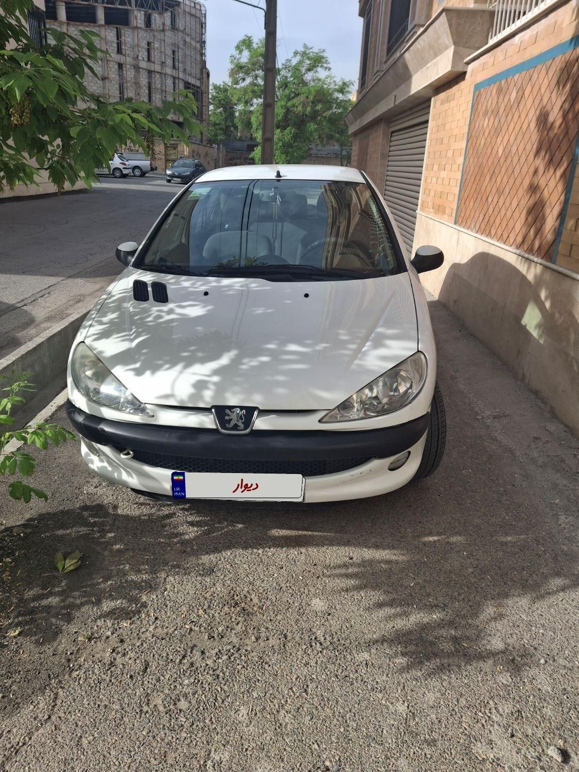 پژو ۲۰۶ صندوق دار v8 - 1399
