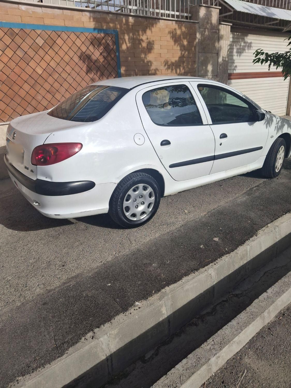 پژو ۲۰۶ صندوق دار v8 - 1399