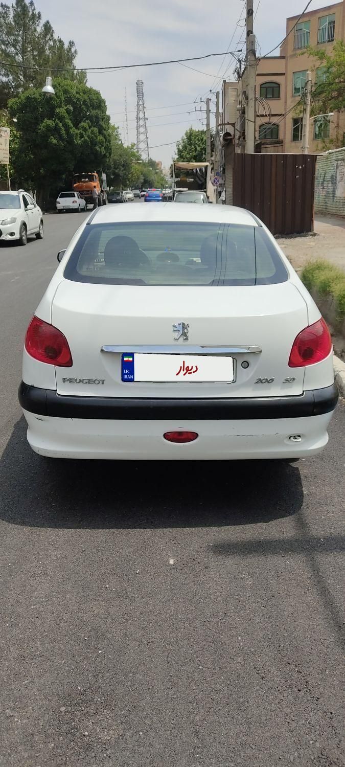 پژو ۲۰۶ صندوق دار v8 - 1398