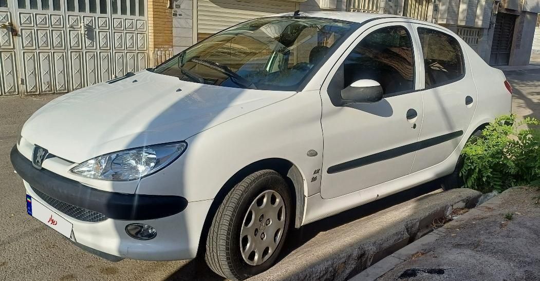 پژو ۲۰۶ صندوق دار v8 - 1396