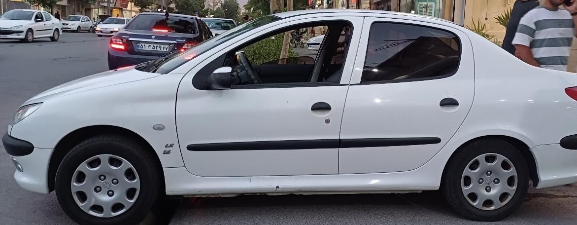 پژو ۲۰۶ صندوق دار v8 - 1396