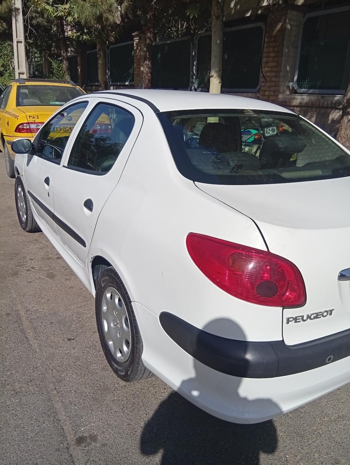 پژو ۲۰۶ صندوق دار v8 - 1397