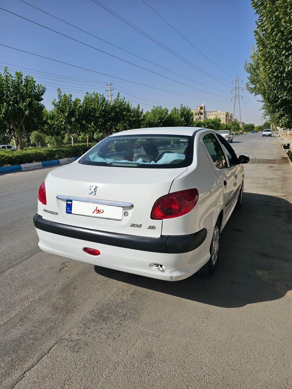 پژو ۲۰۶ صندوق دار v8 - 1399
