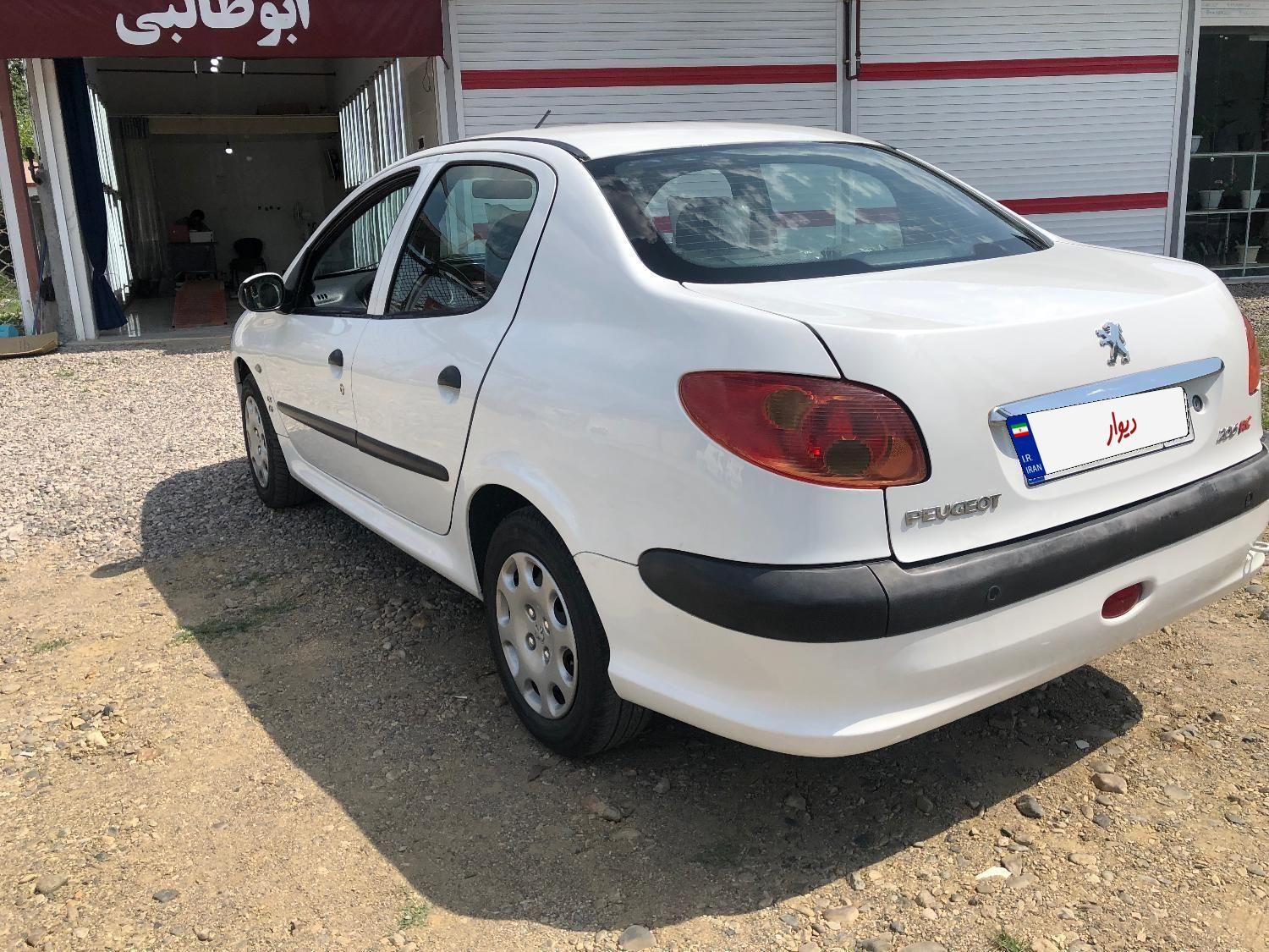 پژو ۲۰۶ صندوق دار v8 - 1395