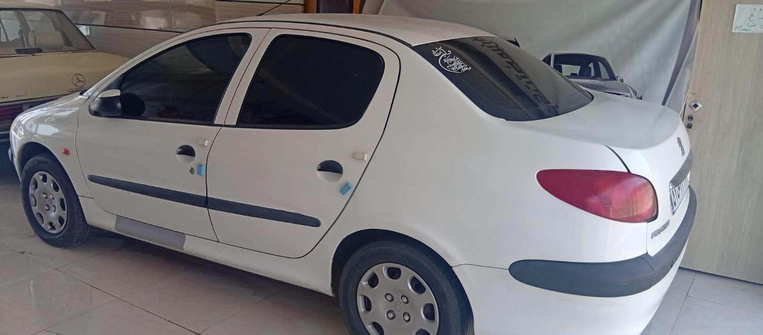 پژو ۲۰۶ صندوق دار v8 - 1396