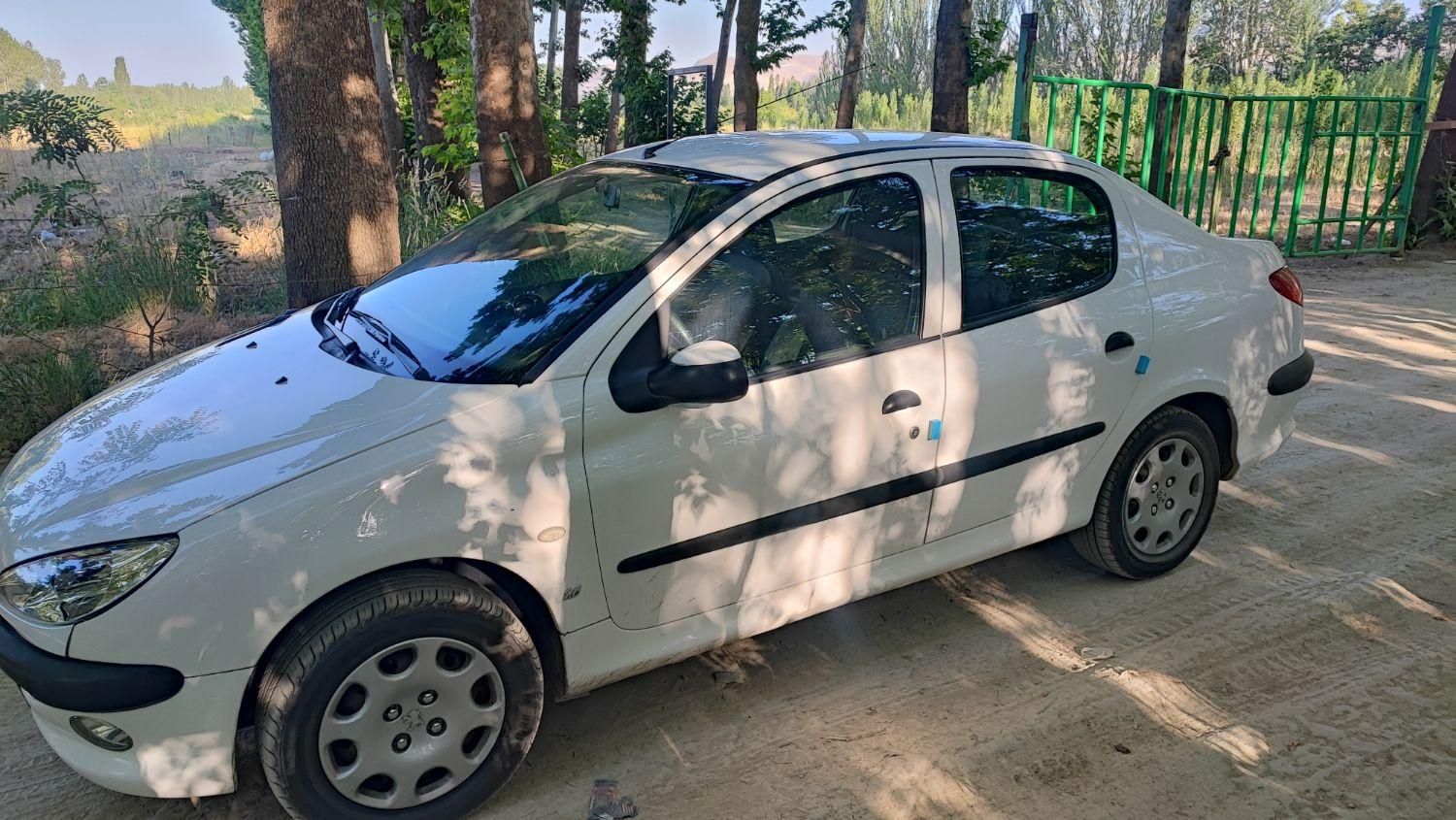 پژو ۲۰۶ صندوق دار v8 - 1397
