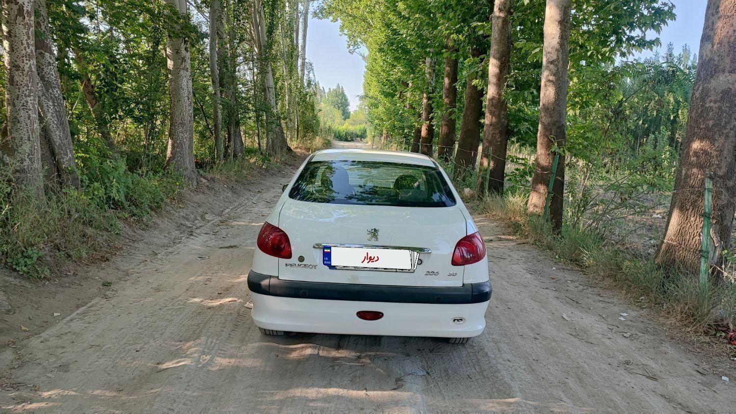 پژو ۲۰۶ صندوق دار v8 - 1397