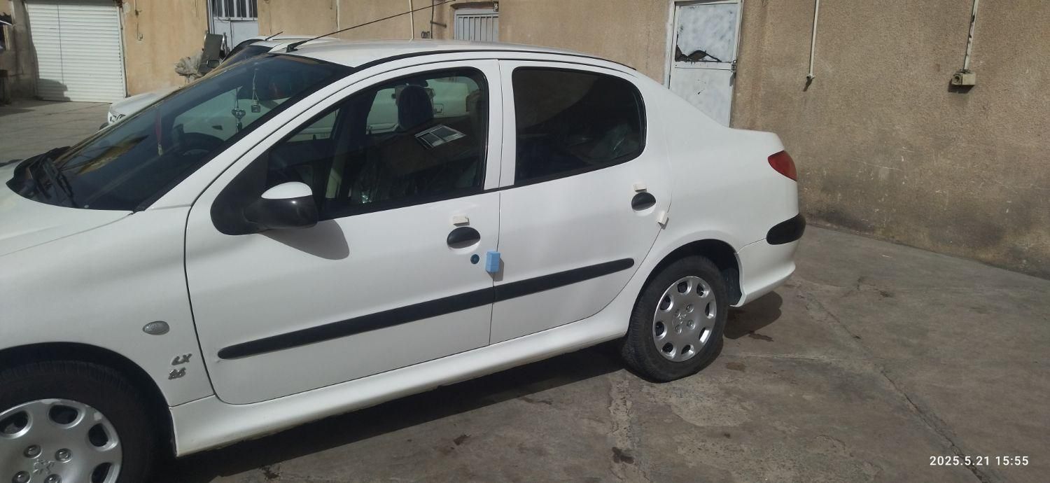 پژو ۲۰۶ صندوق دار v8 - 1396