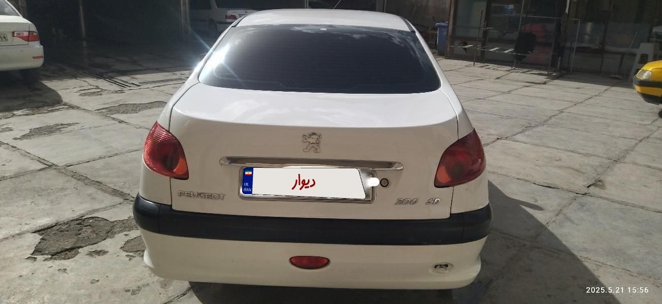پژو ۲۰۶ صندوق دار v8 - 1396