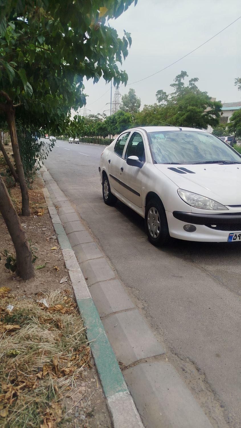 پژو ۲۰۶ صندوق دار v8 - 1394