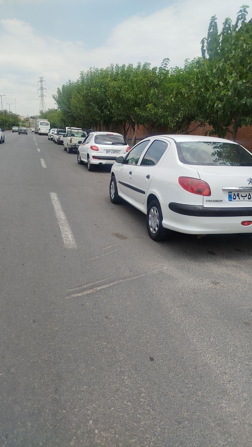 پژو ۲۰۶ صندوق دار v8 - 1394