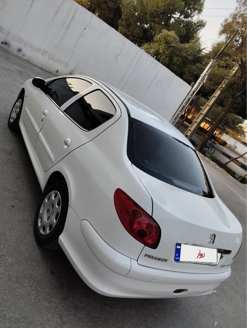 پژو ۲۰۶ صندوق دار v8 - 1395
