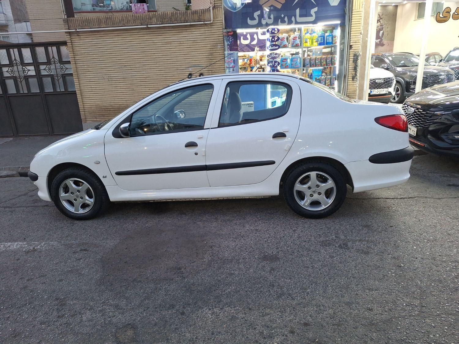 پژو ۲۰۶ صندوق دار v8 - 1398