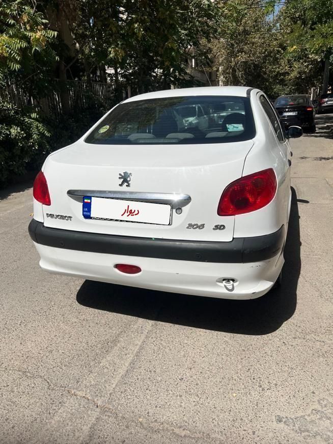 پژو ۲۰۶ صندوق دار v8 - 1397