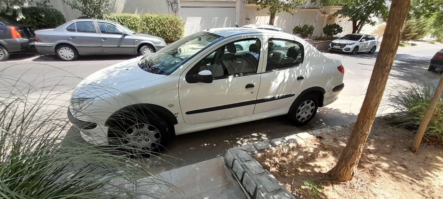 پژو ۲۰۶ صندوق دار v8 - 1396