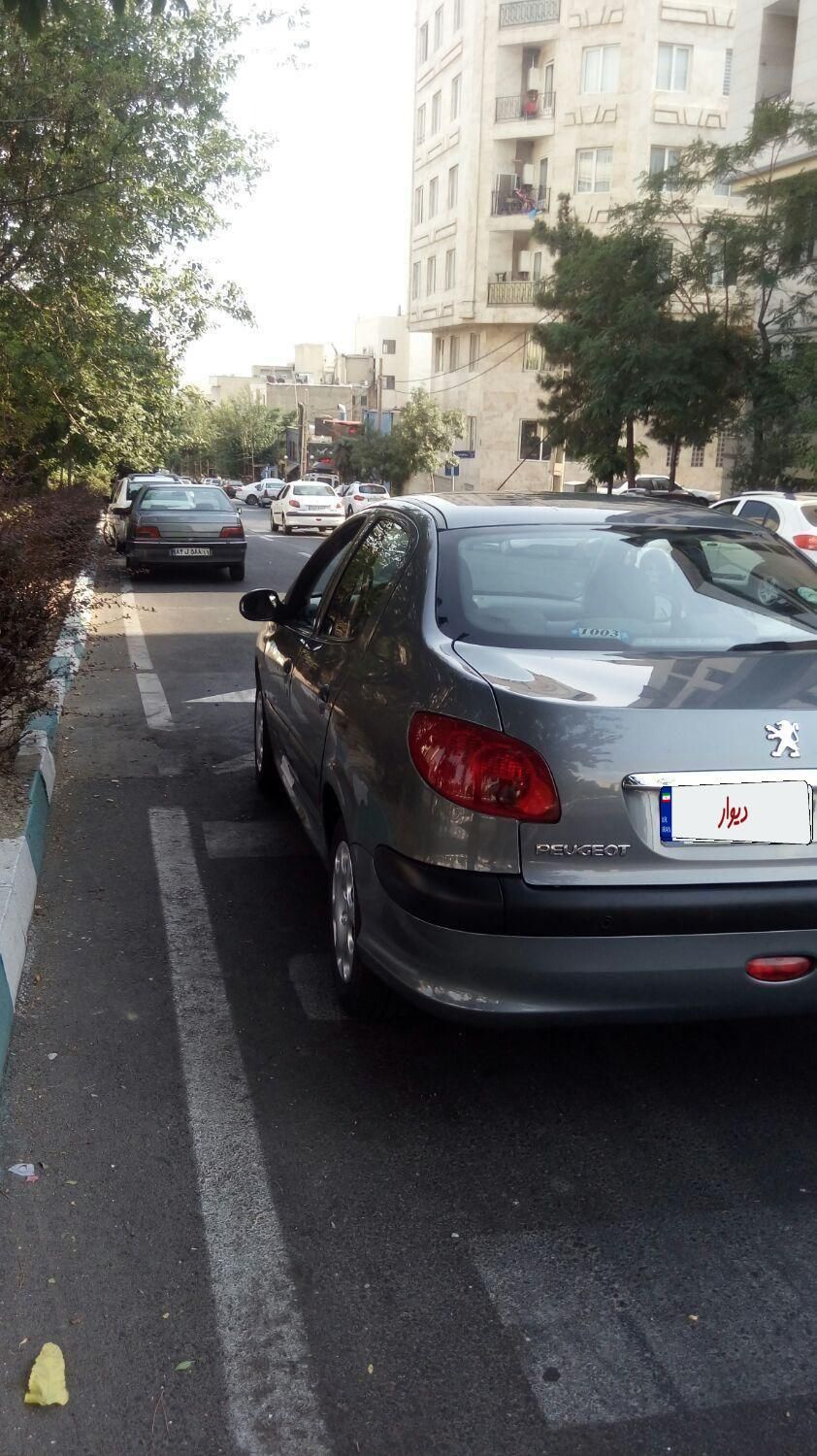 پژو ۲۰۶ صندوق دار v8 - 1394