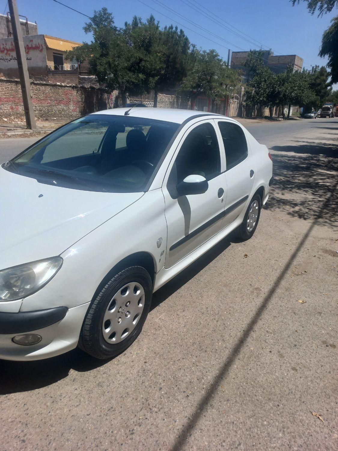 پژو ۲۰۶ صندوق دار v8 - 1391