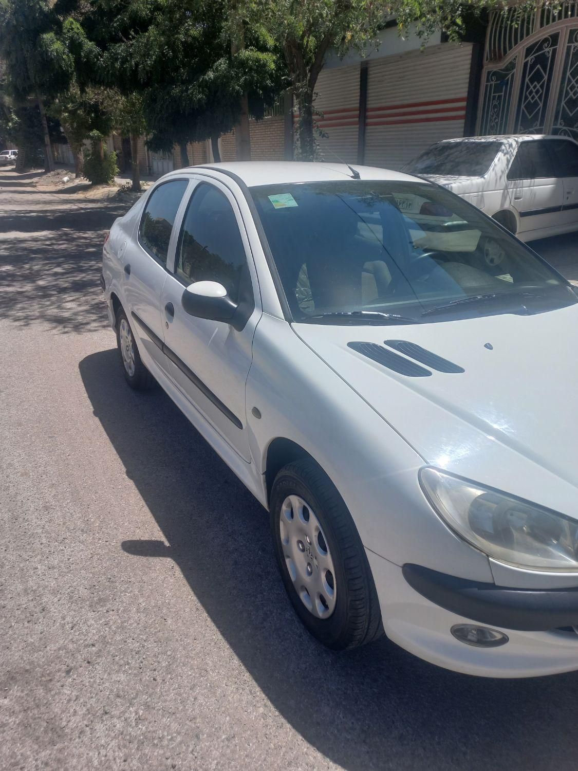 پژو ۲۰۶ صندوق دار v8 - 1391