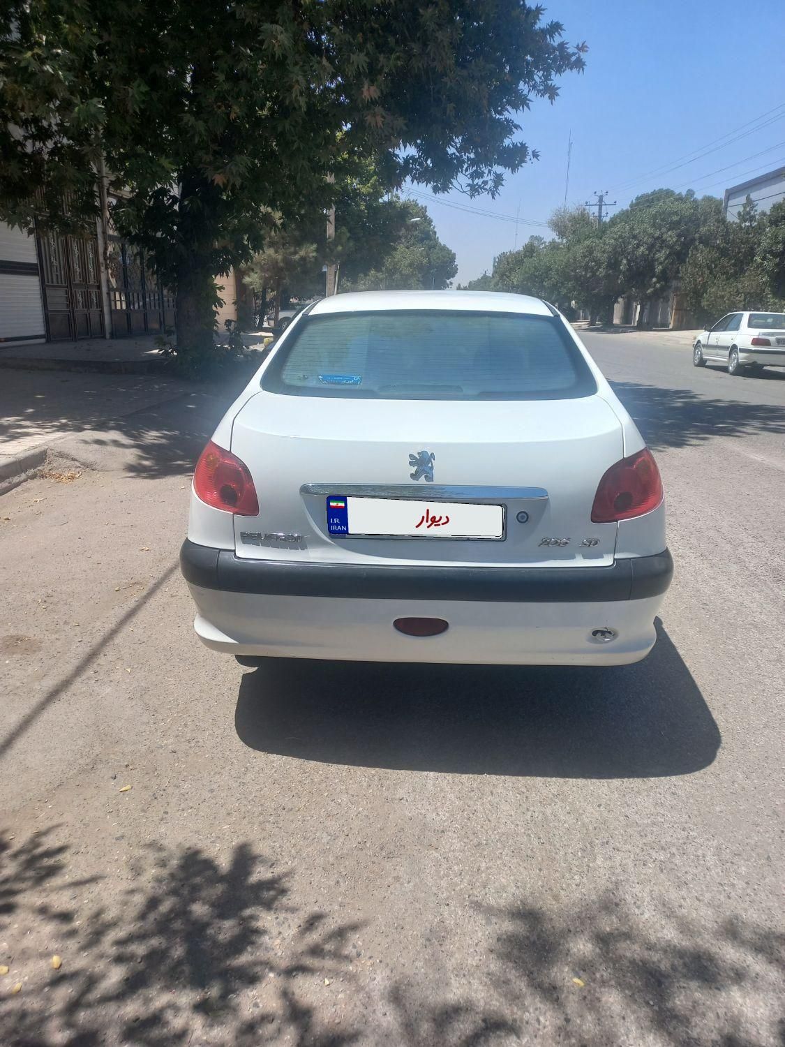 پژو ۲۰۶ صندوق دار v8 - 1391