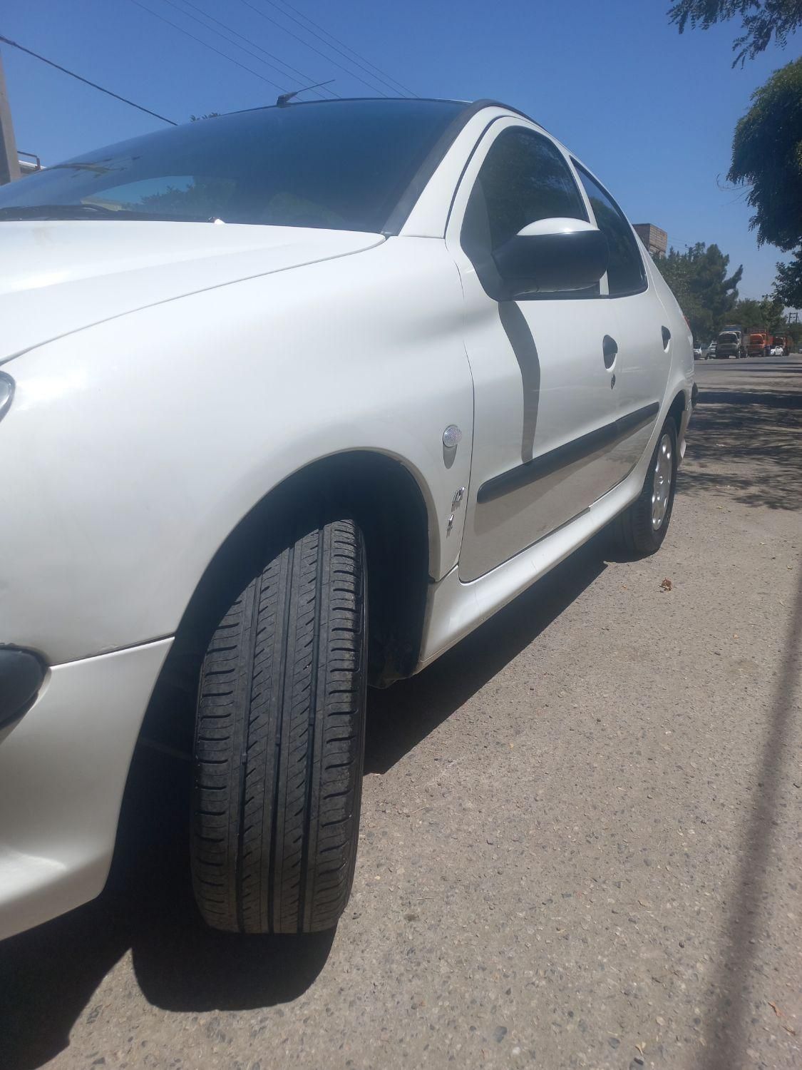 پژو ۲۰۶ صندوق دار v8 - 1391
