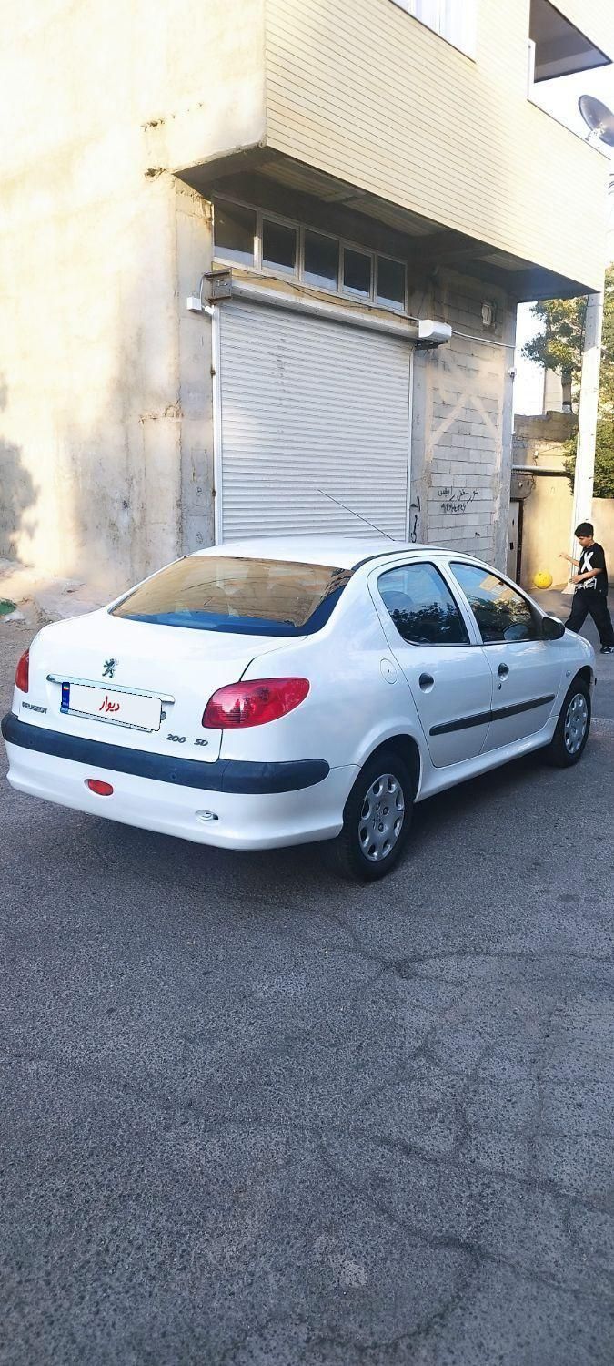 پژو ۲۰۶ صندوق دار v8 - 1395