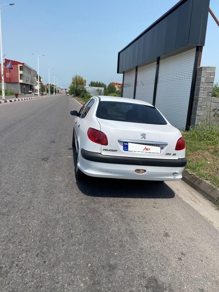 پژو ۲۰۶ صندوق دار v8 - 1390
