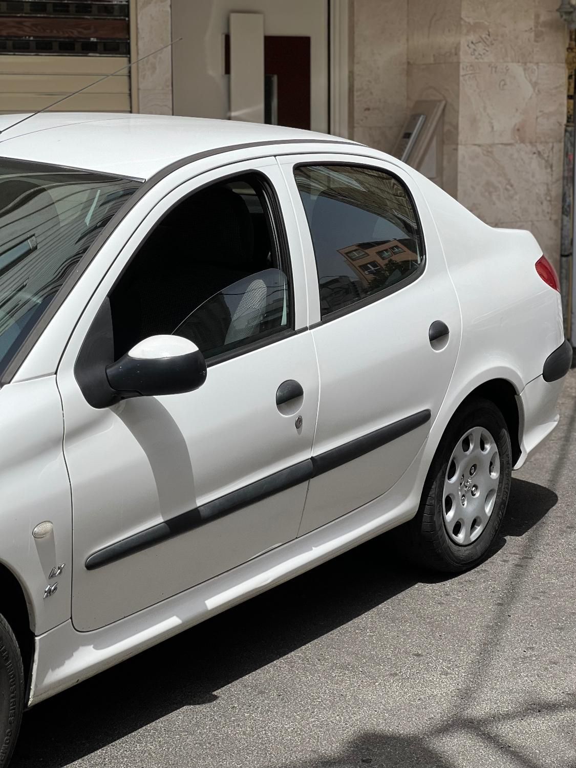 پژو ۲۰۶ صندوق دار v8 - 1399