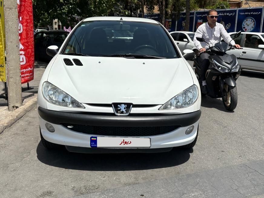 پژو ۲۰۶ صندوق دار v8 - 1396