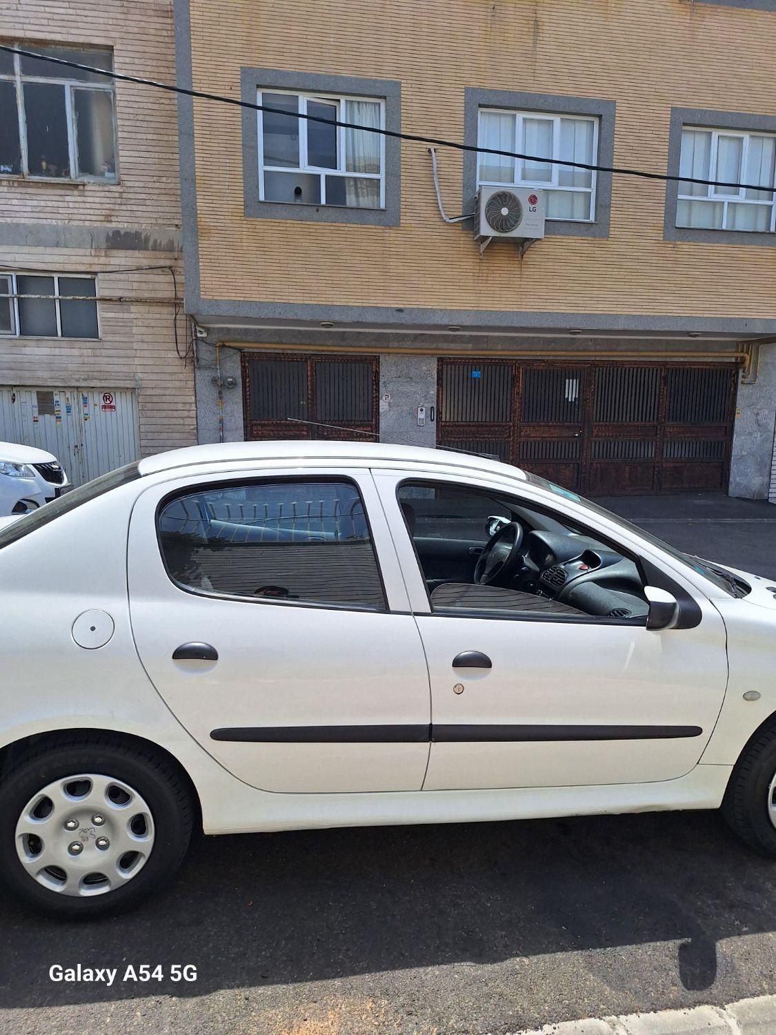 پژو ۲۰۶ صندوق دار v8 - 1393