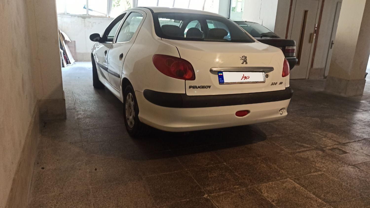 پژو ۲۰۶ صندوق دار v8 - 1395