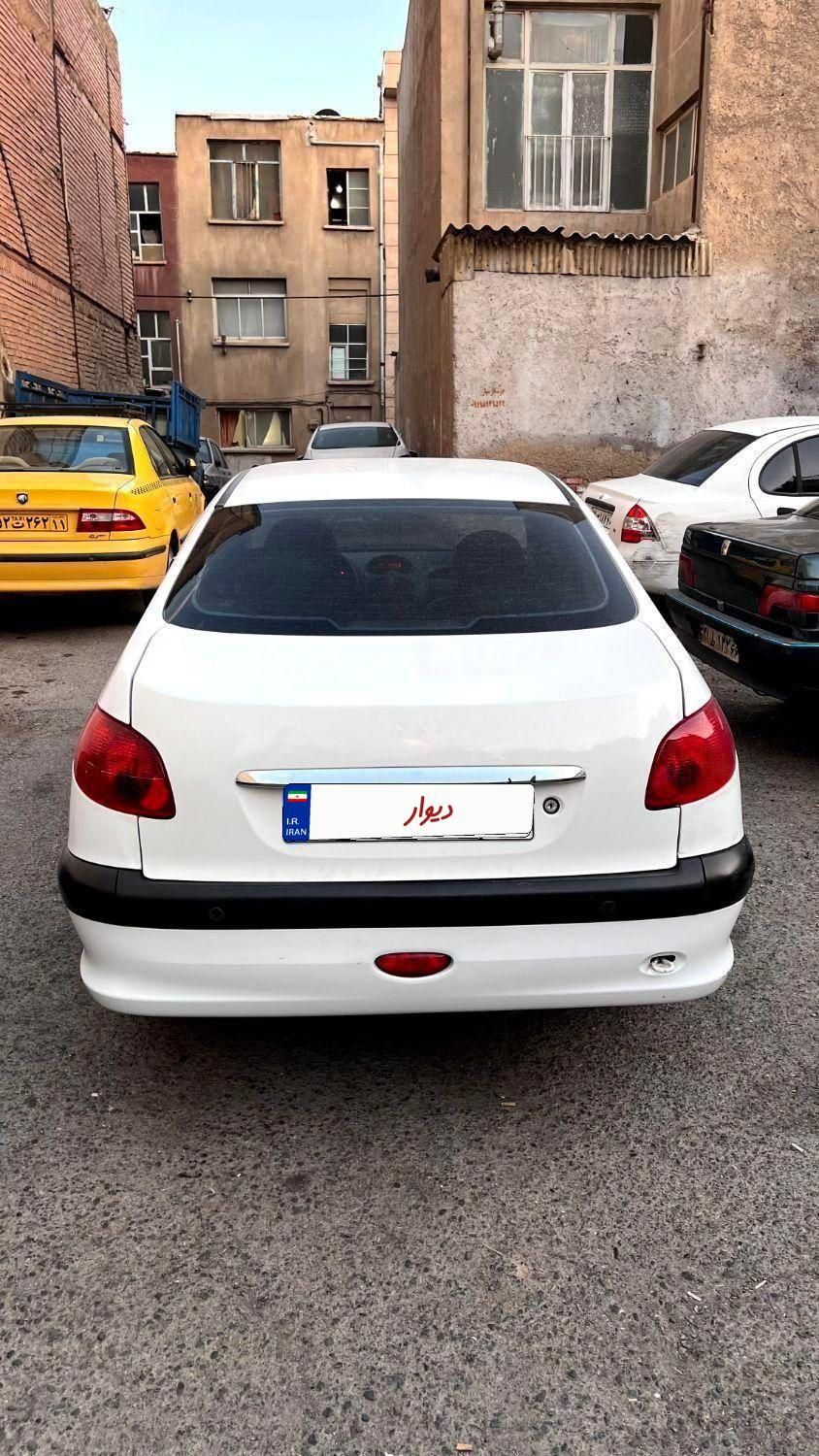 پژو ۲۰۶ صندوق دار v8 - 1397