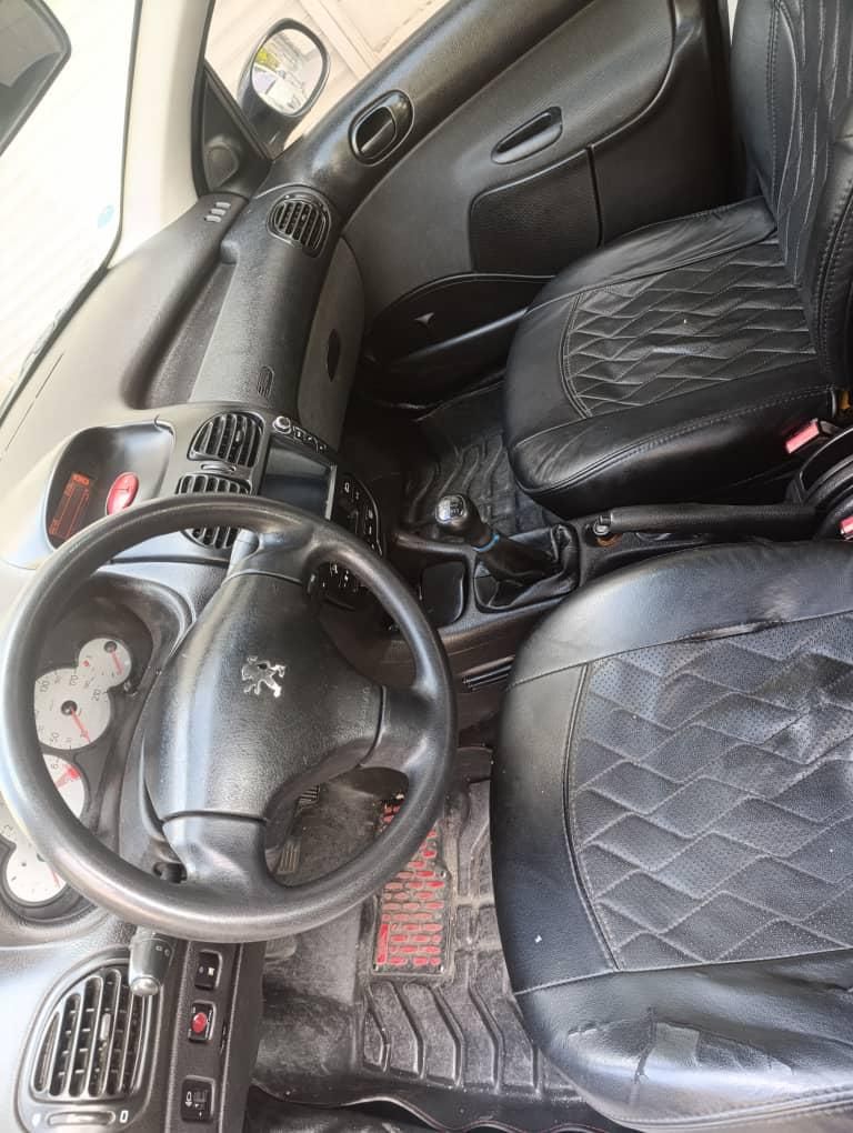 پژو ۲۰۶ صندوق دار v8 - 1396