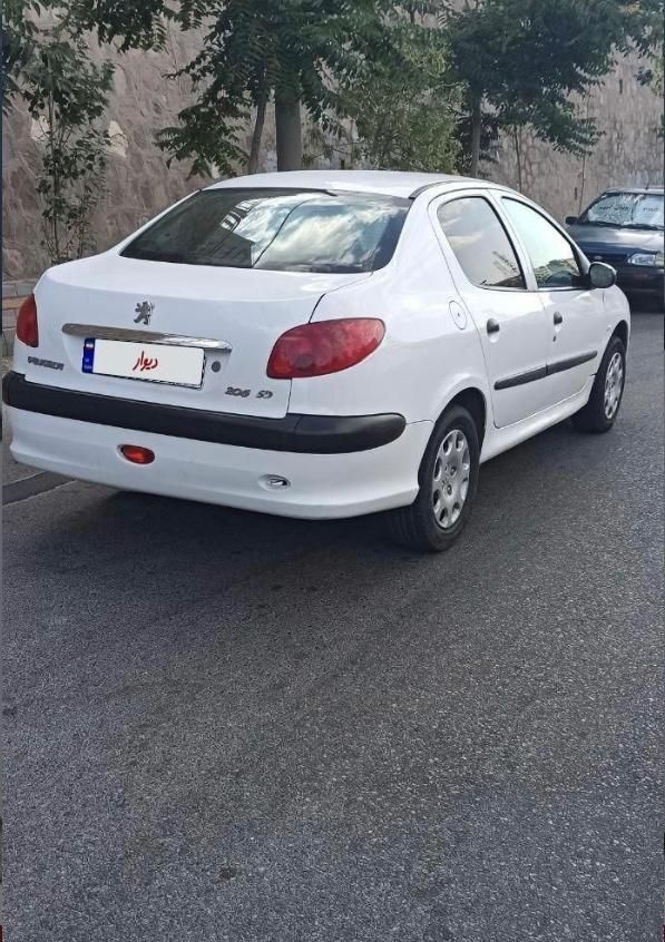 پژو ۲۰۶ صندوق دار v8 - 1391
